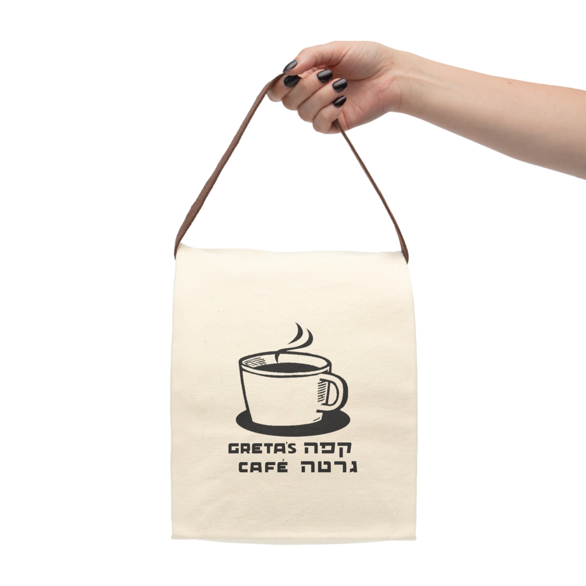 Hand holding Greta's Cafe Canvas Lunch Bag